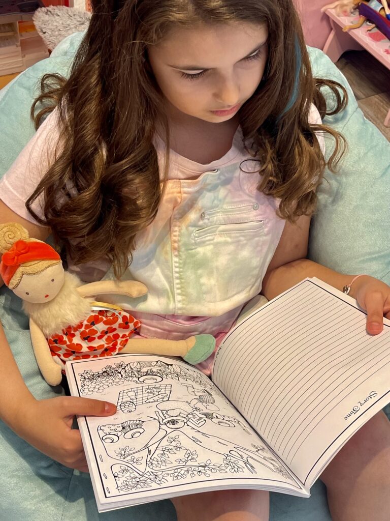 Happy Kid with Coloring Books